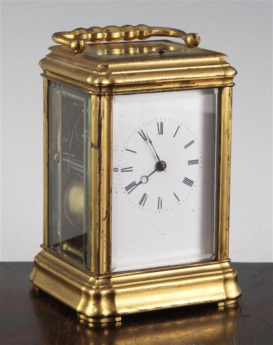 An early 20th century brass gorge cased carriage clock, 5.25 excl. handle.